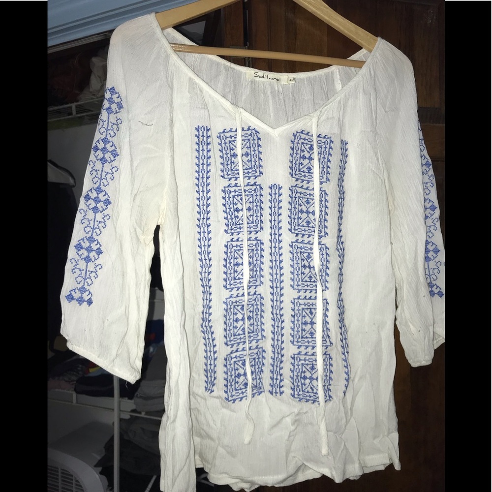 White and blue blouse